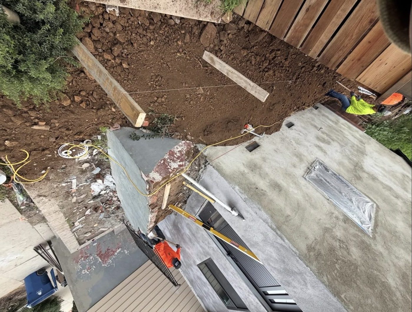 Side yard excavated and formed for retaining work